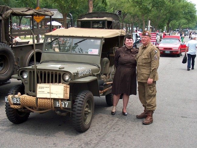 Larry Barber with his wife and jeep