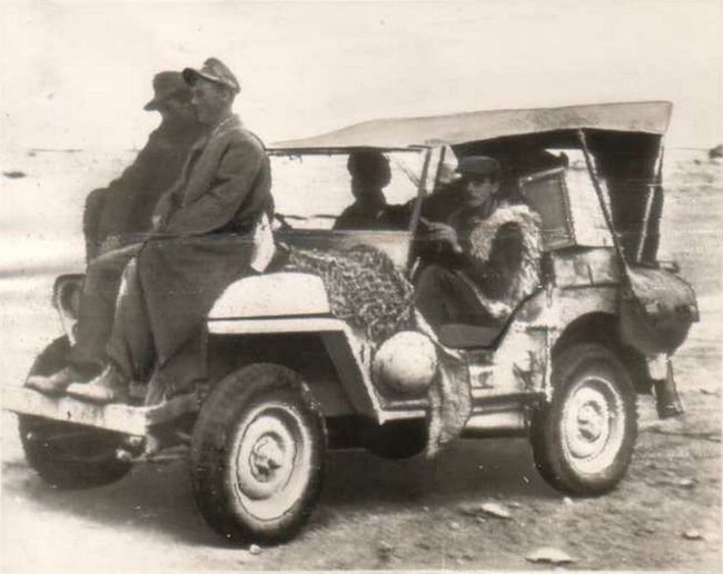 German POW's ride on Jeep