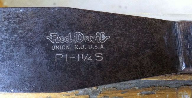 Markings on Red Devil putty knife blade