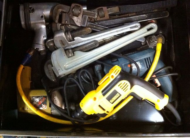 Cabin pipe wrench and drill drawer