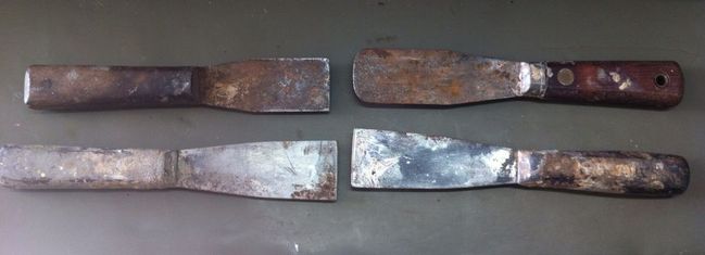 Putty knives before cleaning