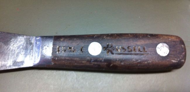 Unusual Russell branded putty knife