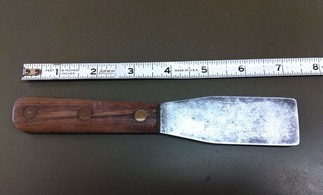 Cleaned up rusty putty knife- other side