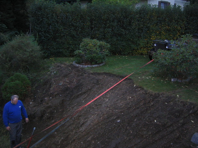 Mowing a cabin up a hill