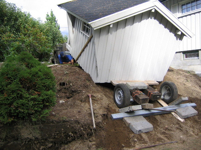 Mowing a cabin up a hill