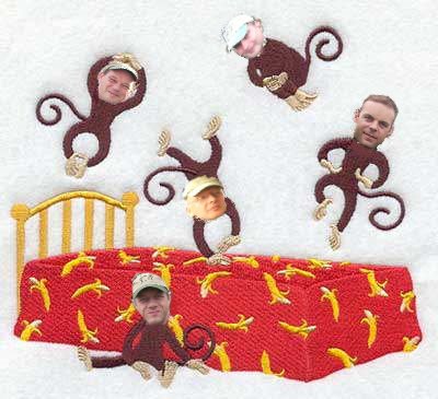 monkeys_on_a_bed